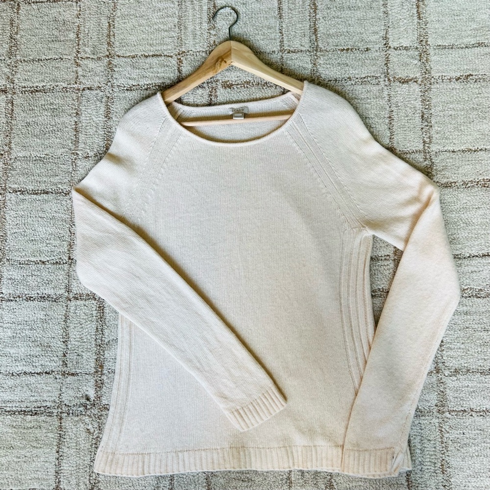 Women’s soft pale orangey pink sweater